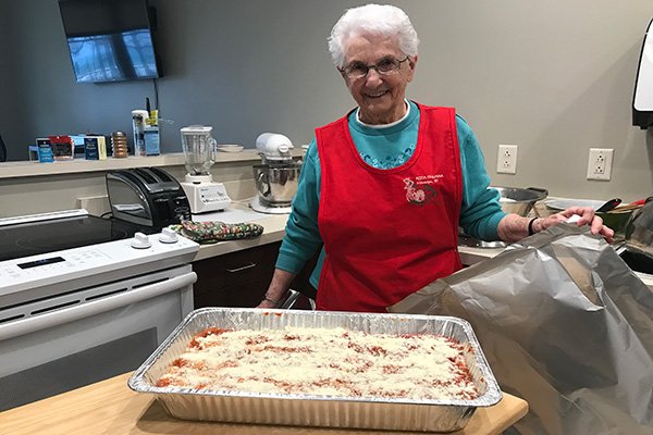 Making casseroles and desserts for women recovering from human trafficking