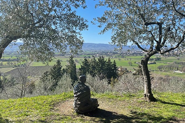 St Francis praying over valley