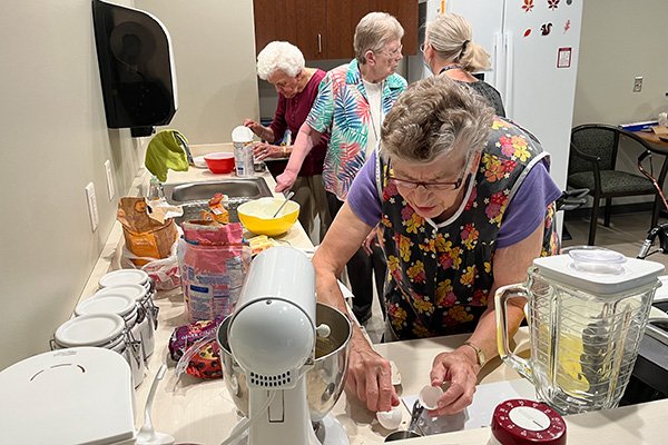 Resident Sisters Bake Cookies and Make Sandwiches for StreetLife Communities